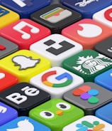 A collection of colorful 3D app icons arranged in a grid-like pattern, featuring well-known brands and services such as Spotify, Netflix, Discord, and Facebook. Each icon is distinct with vibrant colors and recognizable logos, giving a sense of modern digital culture.